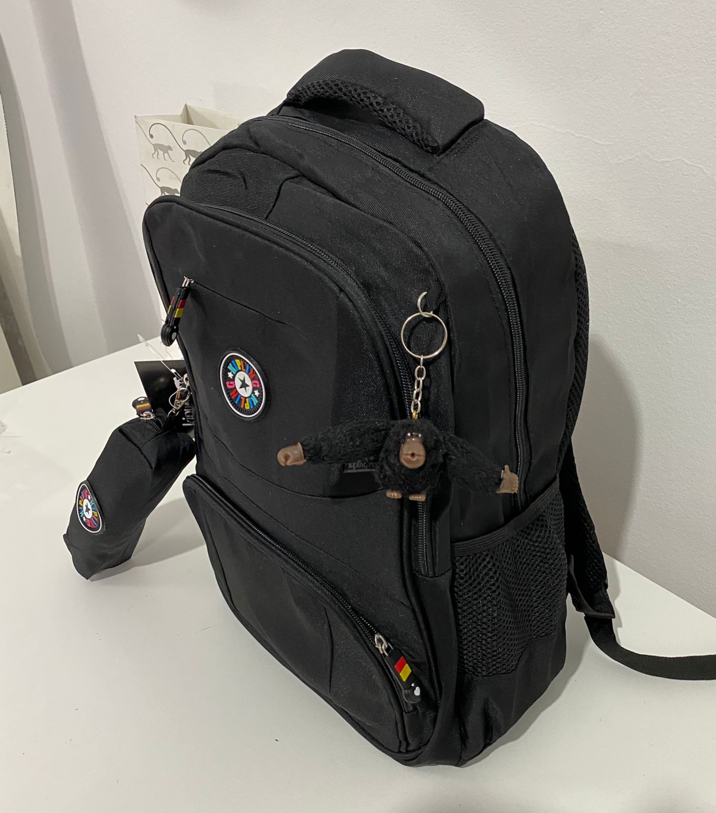 Mochila Kipling com estojo