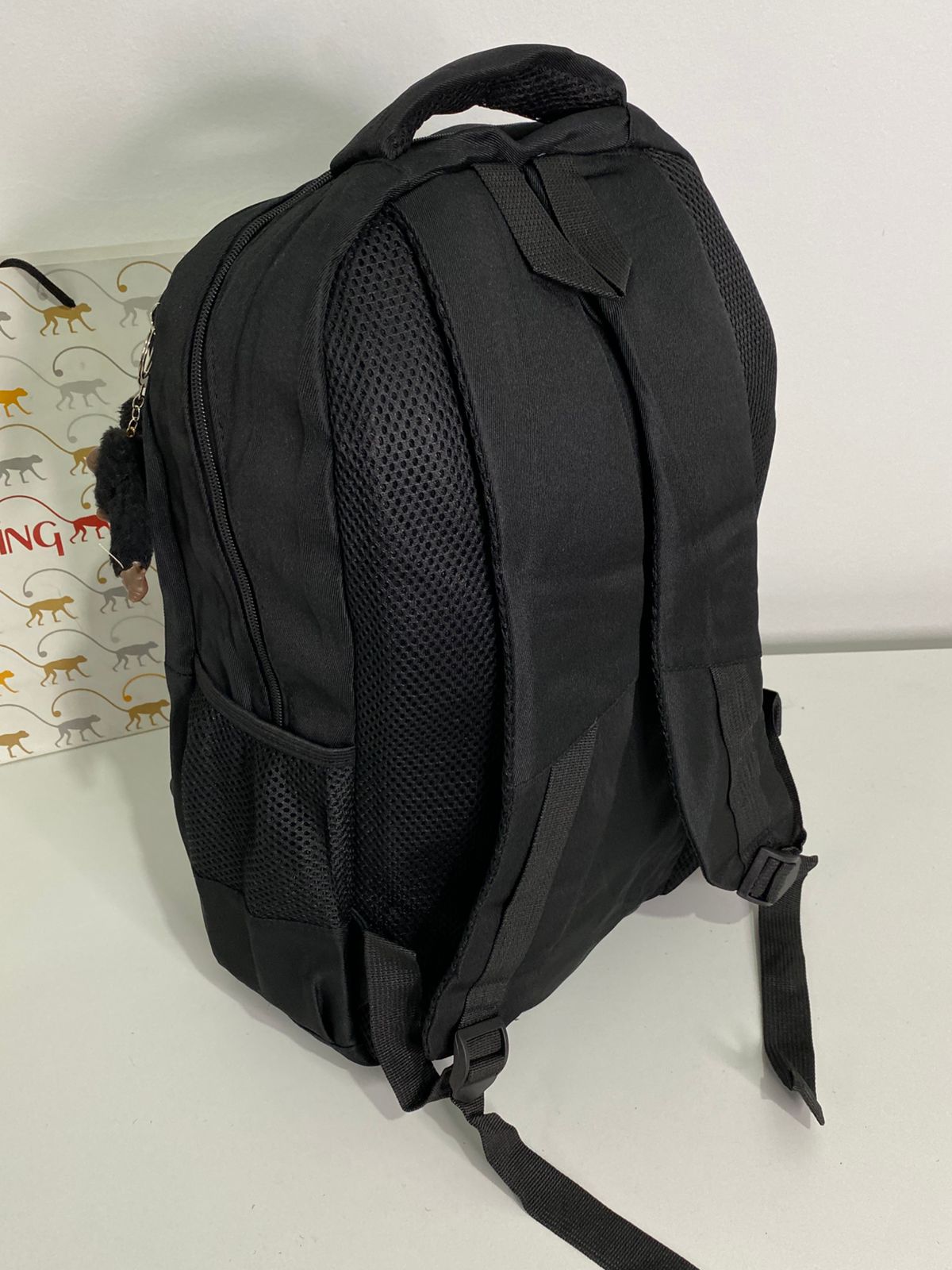 Mochila Kipling com estojo