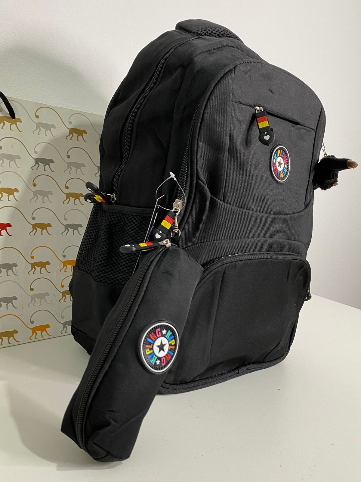 Mochila Kipling com estojo