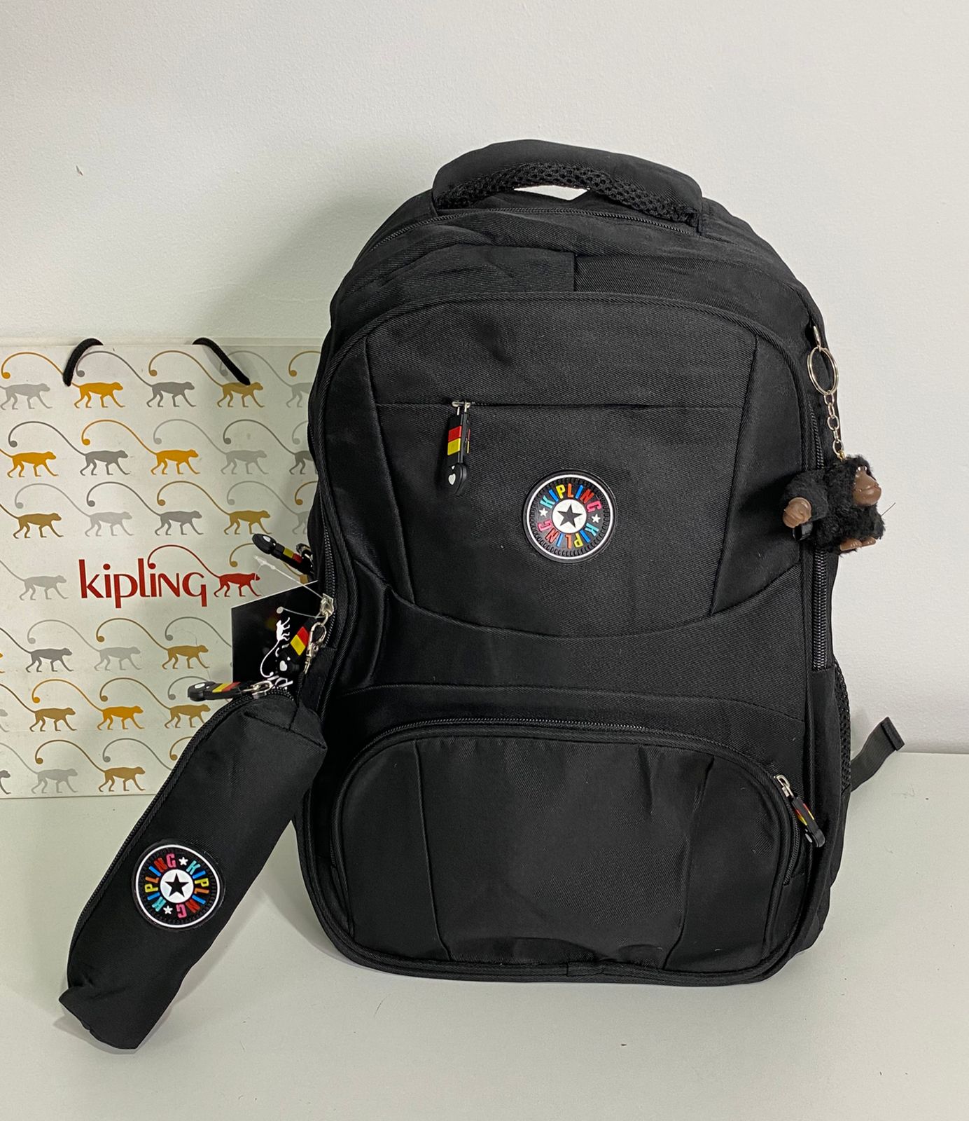 Mochila Kipling com estojo