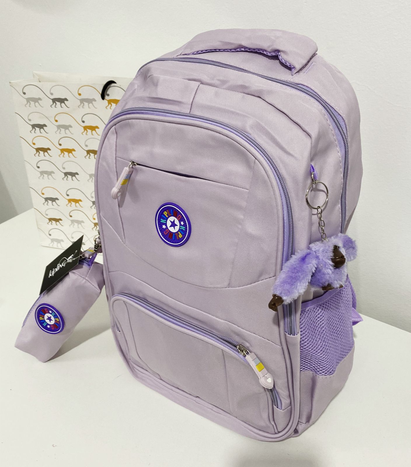 Mochila Kipling com estojo