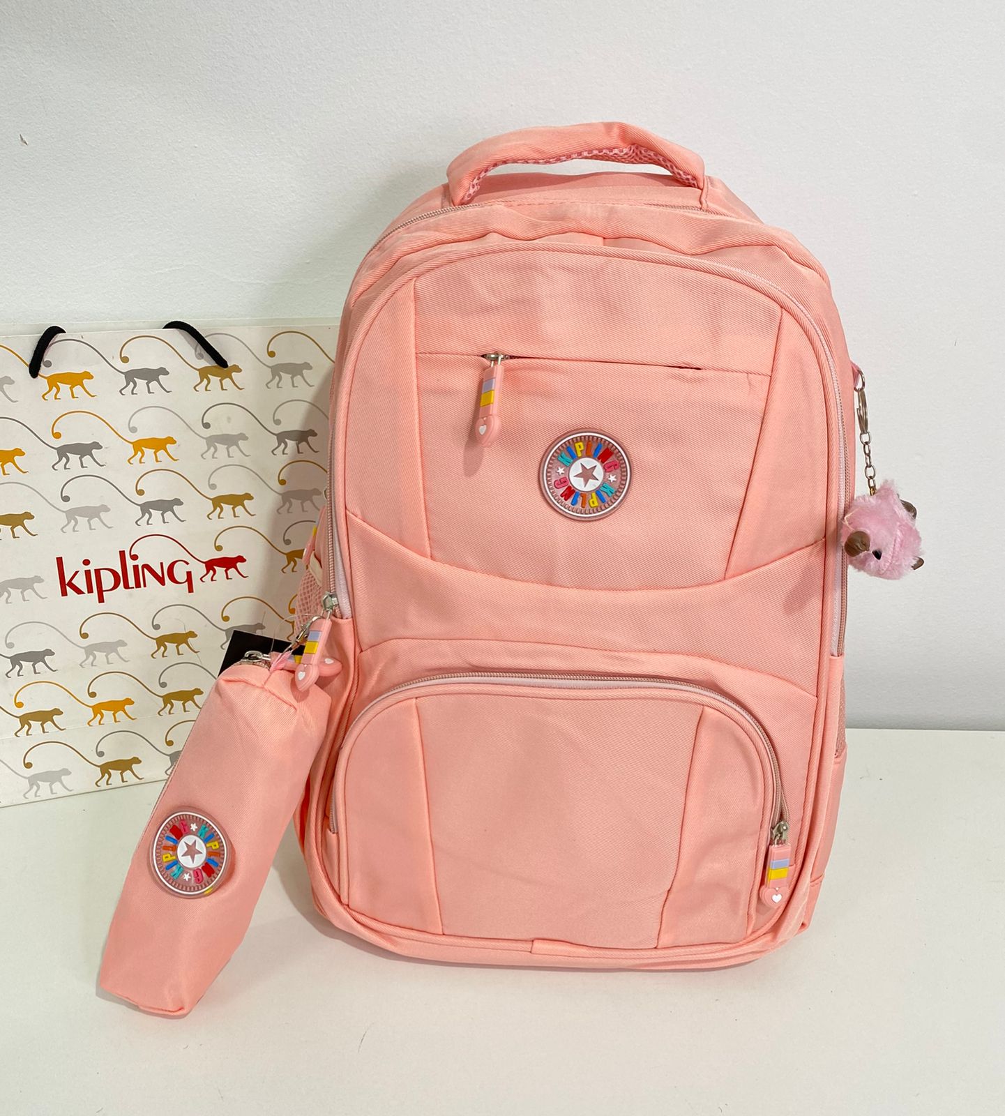 Mochila Kipling com estojo
