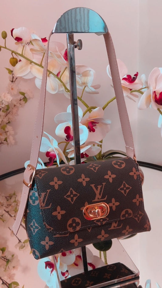 Bolsa pequena Louis Vuitton