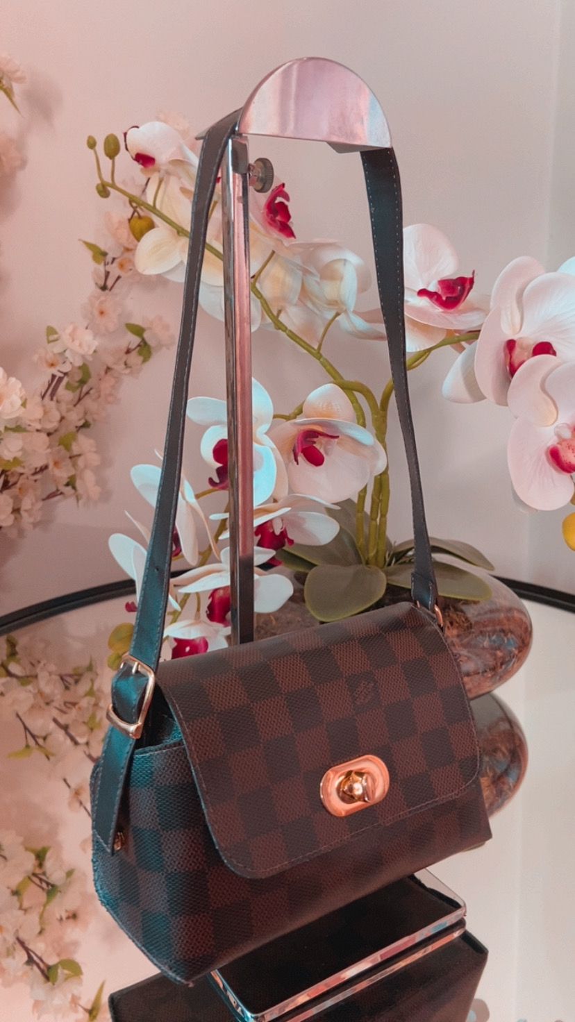 Bolsa pequena Louis Vuitton