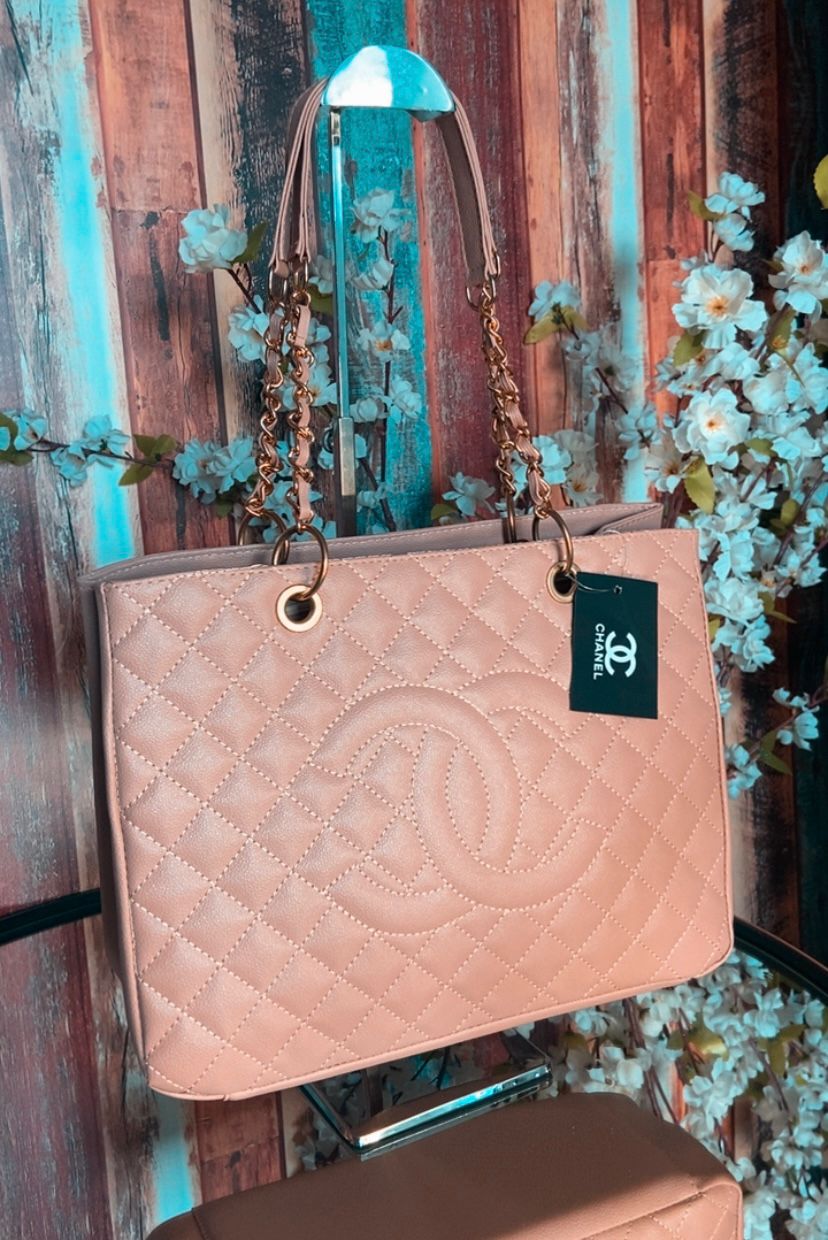Bolsa Chanel Shoper corrente metal dourado