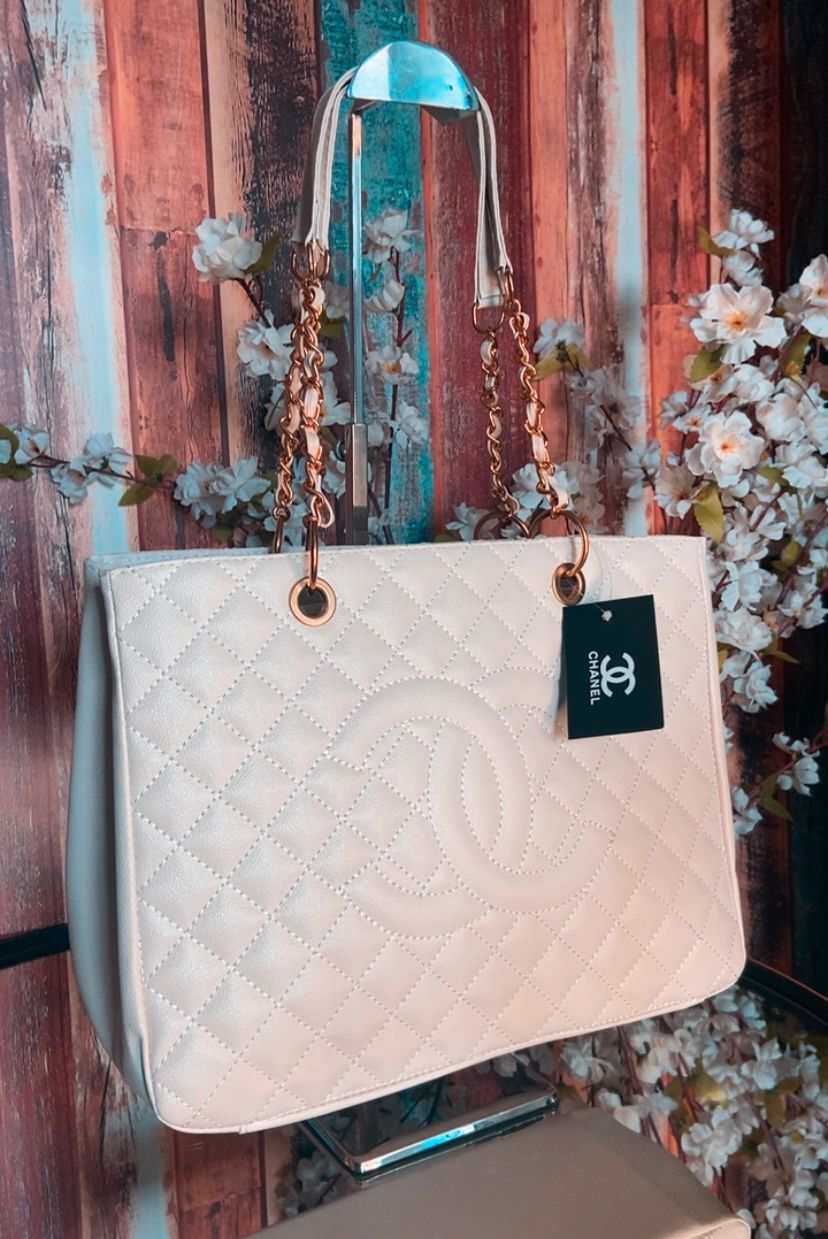 Bolsa Chanel Shoper corrente metal dourado